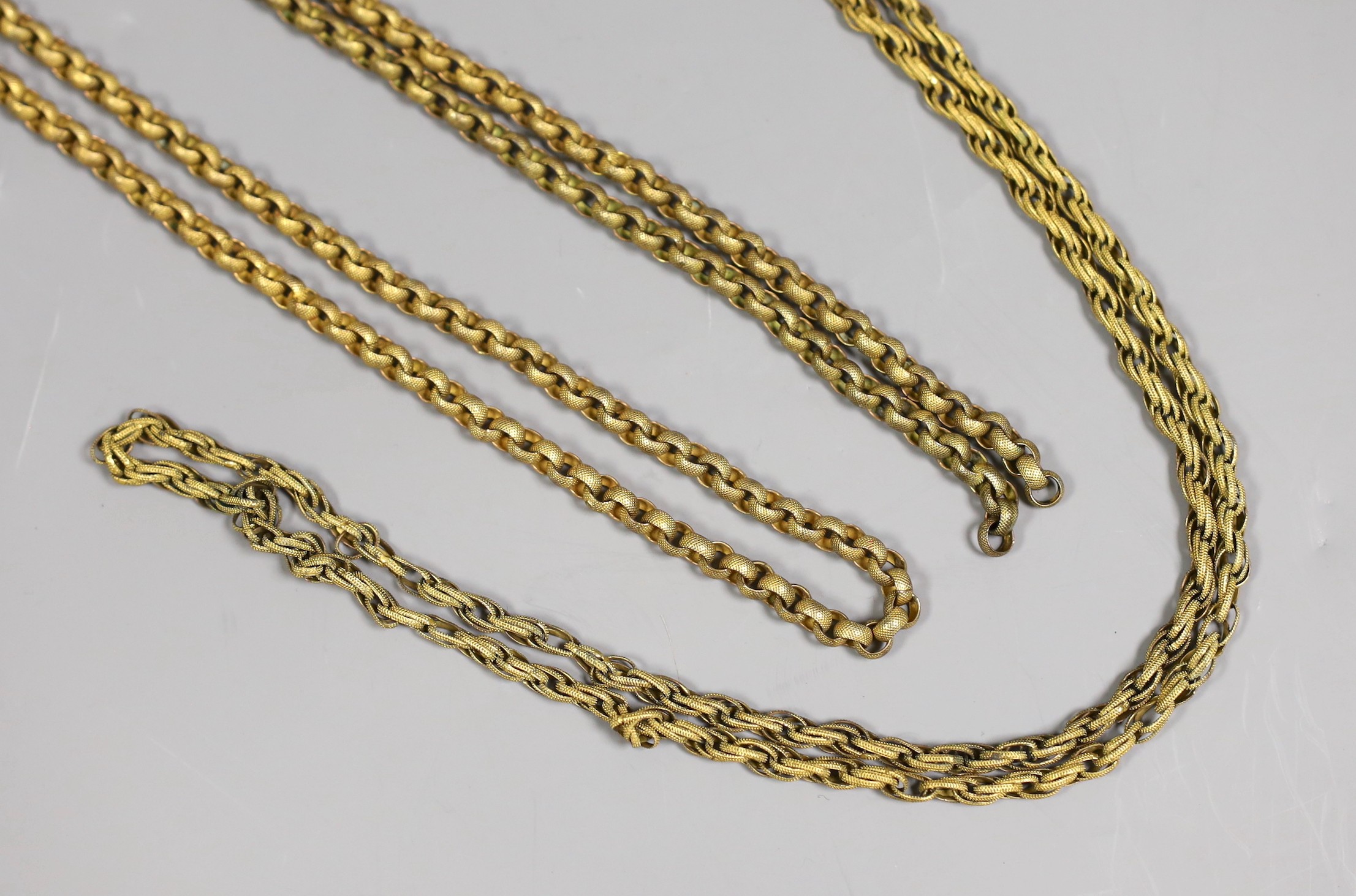 Two 19th century pinchbeck guard chains, longest 118 cm(a.f.)